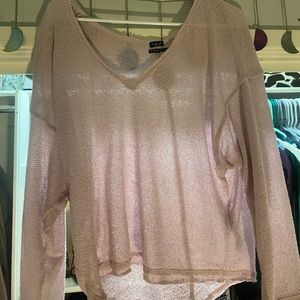 Out from under sweater